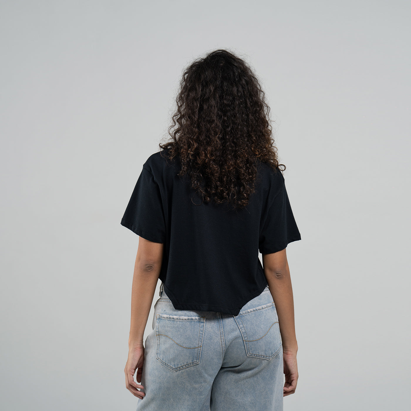Camiseta de Mujer Corte Irregular Negra